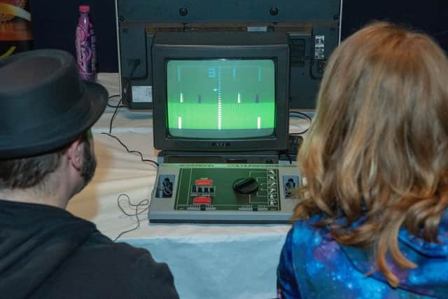 Players enjoy a game of Pong at last year's first Games Fest at Portsmouth Guildhall. Picture: Vernon Nash (180421-003)