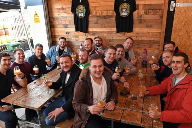 Staggeringly Good Brewery has opened a new bar 'The House of Rapture'. A group from Compass Associates in Cosham test the beers
Picture by:  Malcolm Wells (181221-1162)