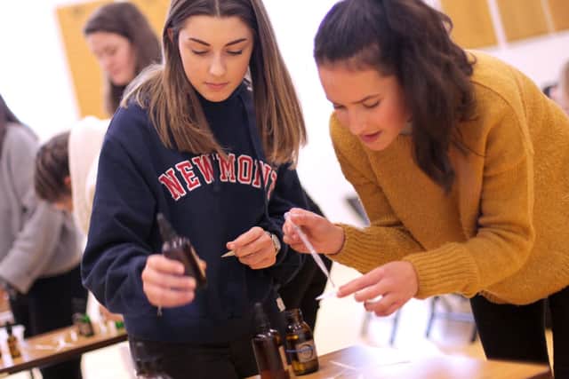 Portsmouth High School girls become alchemists for the day and cultivate key life skills. To celebrate the end of mock examinations, Year 11 girls spent the day with a group of alchemists and took part in a Dragons Den style workshop where they designed, created and marketed a new fragrance.The day included learning how to make a new perfume from a variety of perfume essences, designing the bottles and labels, marketing the product and finally presenting to a panel of expert judges to pitch their ideas.Pictured is: Claudia Dorey and Juliette Phillips.Picture: Sally Tiller