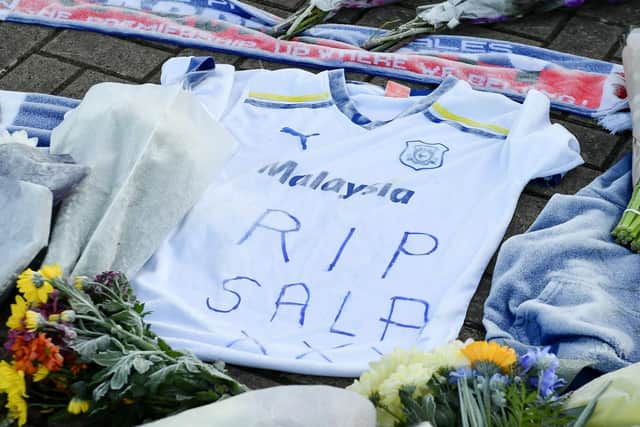 Tributes left outside Cardiff City Football Club after a plane with new signing Emiliano Sala on board went missing over the English Channel on Monday night. Picture: Ben Birchall/PA Wire