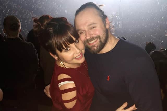 Cheryl Gibbs and husband Matt watching The 1975 at the O2 arena