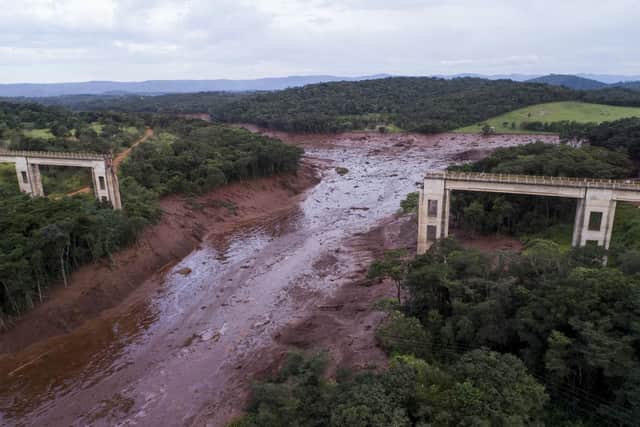 An aerial view shows a collapsed bridge caused by flooding triggered by a dam collapse near Brumadinho, Brazil. Picture: Bruno Correia/Nitro via AP