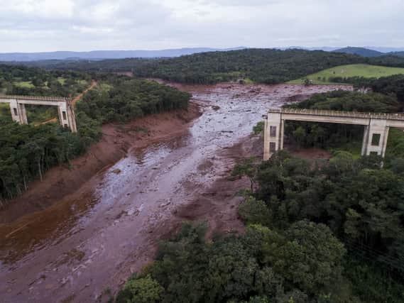 An aerial view shows a collapsed bridge caused by flooding triggered by a dam collapse near Brumadinho, Brazil. Picture: Bruno Correia/Nitro via AP