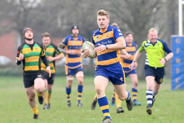 Gosport & Fareham's Dom Holling dislocated his knee in his side's loss at KCS Old Boys. Picture: Neil Marshall