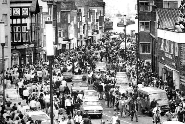 Thousands gather in Broad Street, Old Portsmouth to greet the homecoming of HMS Hermes from the Falklands.
