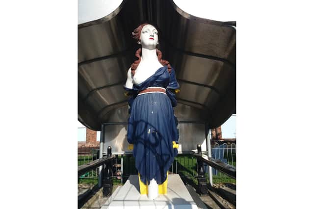 The wooden figurehead from Royal Navy ship HMS Arethusa has been given protected status 
Picture: Historic England/PA Wire