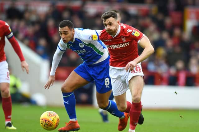 James Vaughan, left, in action for Wigan against Nottingham Forest Picture: Tony Marshall/Getty Images