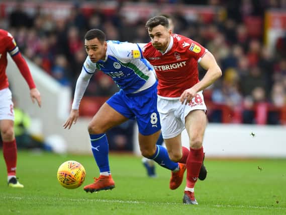 James Vaughan, left, in action for Wigan against Nottingham Forest  Picture: Tony Marshall/Getty Images