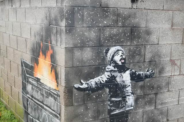 Artwork by Banksy found in Tailbach in Port Talbot, Wales. The Bishop of Portsmouth, Christopher Foster says graffiti has been around for thousands of years depicting and mocking Christians Photo credit: Ben Birchall/PA Wire