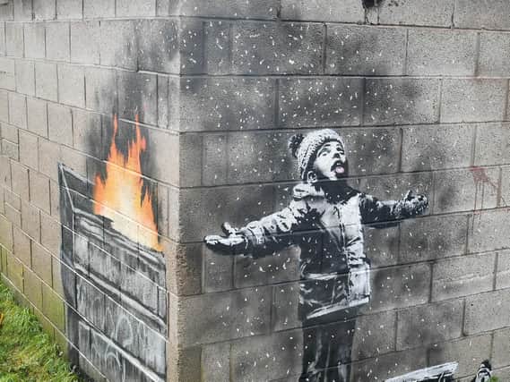 Artwork by Banksy found in Tailbach in Port Talbot, Wales. The Bishop of Portsmouth, Christopher Foster says graffiti has been around for thousands of years depicting and mocking Christians Photo credit: Ben Birchall/PA Wire