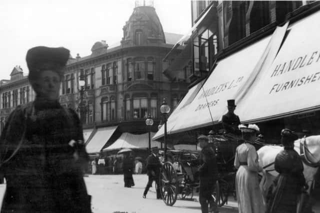 Although an Edwardian period photograph the lady to the left is obviously of Victorian birth. Osborne Road, Southsea.