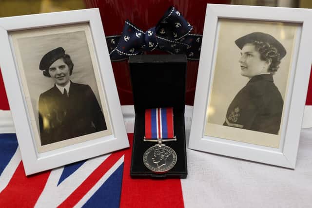 Kathleen Blower when she was in the Royal Navy and her WWII medal
Picture: LPhot Barry Swainsbury