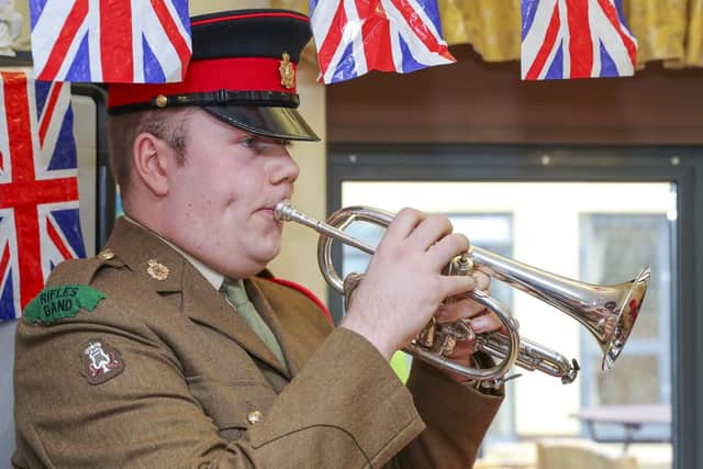 The Last Post being played at Harry Sotnick House for Kathleen Blower's medal presentation
Picture: LPhot Barry Swainsbury