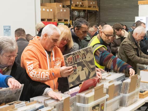 Record collectors sift through the boxes of records. Picture: Keith Woodland (020219-13)
