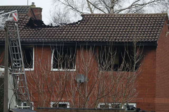 The scene of a house fire in Sycamore Lane, Stafford, which claimed the lives of four children. Picture: Aaron Chown/PA Wire