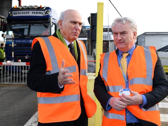 Sir Vince Cable, left, and Gerald Vernon-Jackson, leader of Portsmouth City Council at Portsmouth International Port last month
Picture: Malcolm Wells (190108-1903)