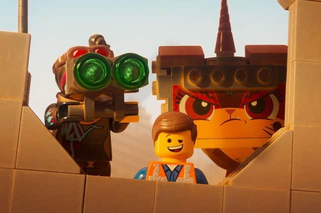 Lucy (voiced by Elizabeth Banks), Emmet (Chris Pratt) and Unikitty (Alison Brie) in The Lego Movie 2.