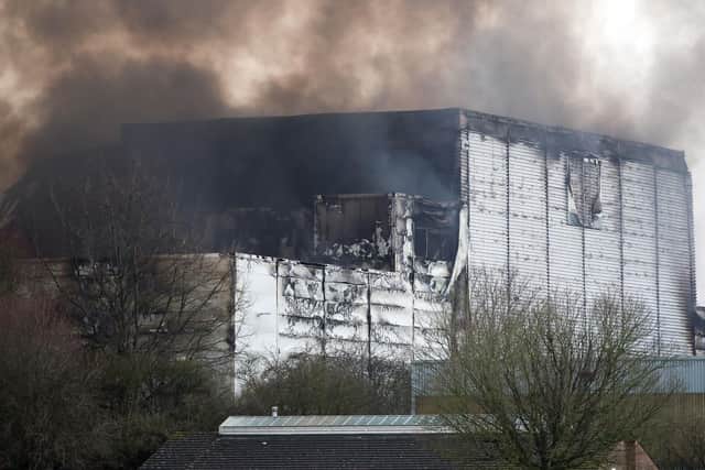 A view of the smoking Ocado robotic warehouse in Andover. Picture: Andrew Matthews/PA Wire