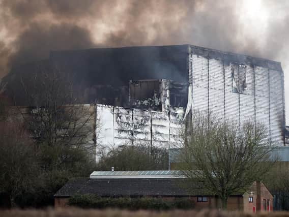 A view of the smoking Ocado robotic warehouse in Andover. Picture: Andrew Matthews/PA Wire
