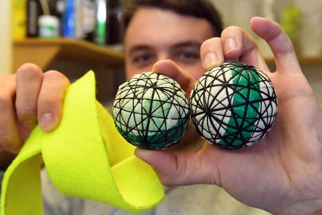 Seacourt's Aaron Flippance making some real tennis balls. All balls used at Seacourt are made on the premises.