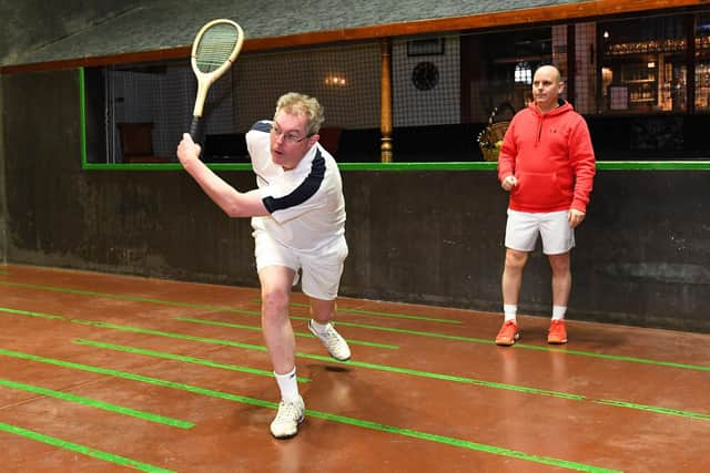 Simon Carter attempts a shot under the watchful eye of Andrew Lyons