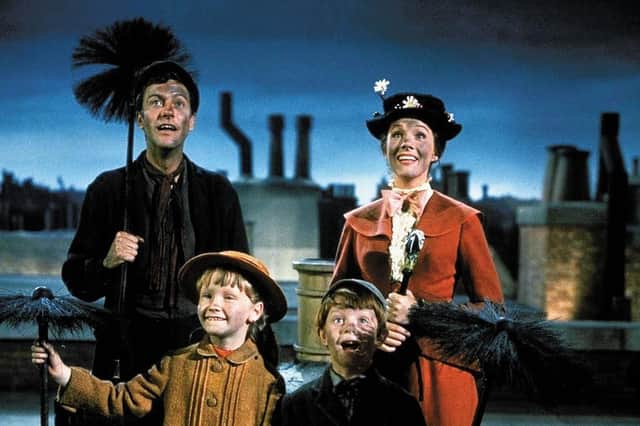 Mary Poppins, complete with soot on face, in the 1964 film