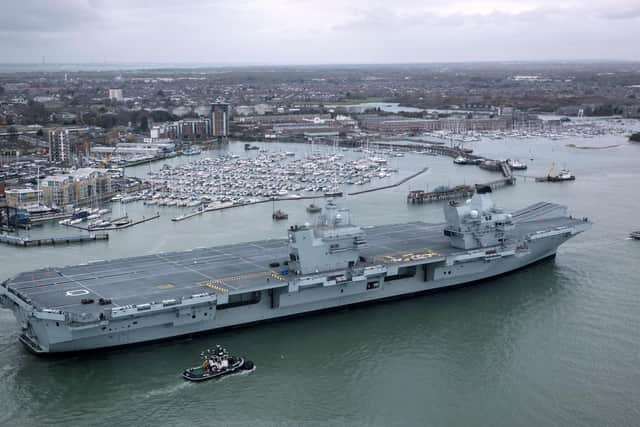 These are your suggestion for when HMS Queen Elizabeth should sound her horn. (Photo by Matt Cardy/Getty Images)
