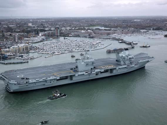 These are your suggestion for when HMS Queen Elizabeth should sound her horn. (Photo by Matt Cardy/Getty Images)