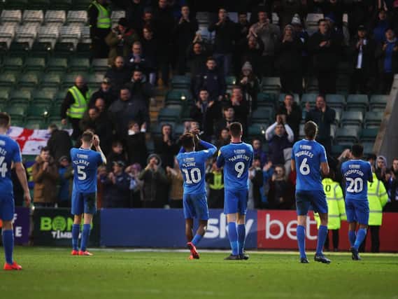 Pompey players applaud their fans after the Plymouth draw. Picture: Joe Pepler