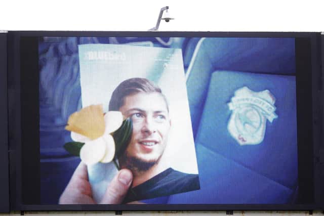 A big screen shows a tribute to the late Emiliano Sala during the Premier League match at St Mary's Stadium, Southampton, yesterday. Picture: Mark Kerton/PA Wire