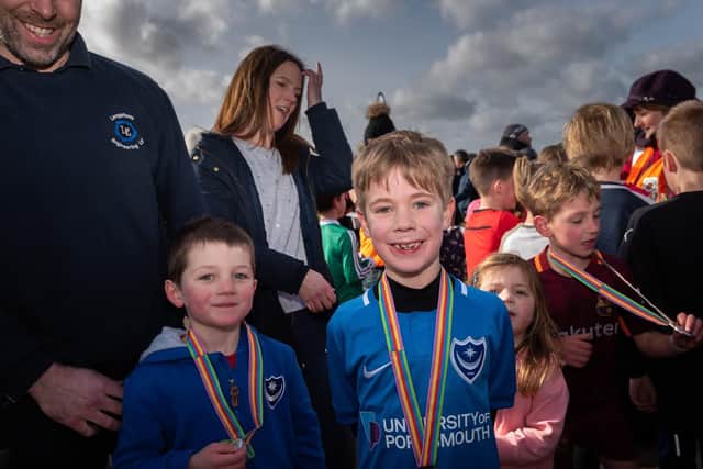 Harry Pearson, six and Max Arnold, seven proudly show off their medals at the Whiteley Fun Run.  Picture: Vernon Nash (090219-062)