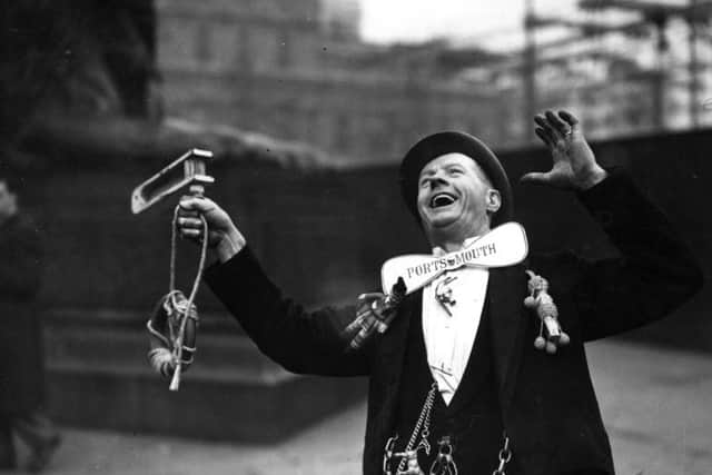 April 29 1939:  A Pompey supporter cheering his team in Trafalgar Square, London, before their FA Cup Final match against Wolverhampton Wanderers at Wembley Stadium.