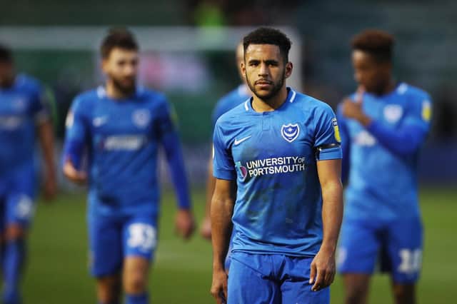 Nathan Thompson and his Pompey team-mates leave the pitch at Plymouth Picture: Joe Pepler