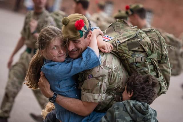 A soldier is welcomed back home after six months in Iraq. Photo: MoD