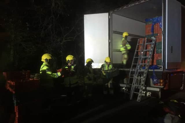 The six people were discovered during a search of the lorry. Picture: @whitchurch06/PA Wire
