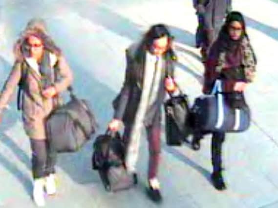 CCTV still of (left to right) 15-year-old Amira Abase, Kadiza Sultana, 16, and Shamima Begum who fled the country to join ISIS. Picture: Metropolitan Police/PA Wire