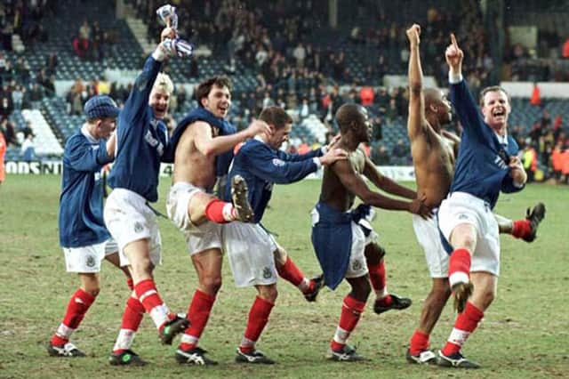 The Pompey team do the conga after their FA Cup victory over Leeds in 1997