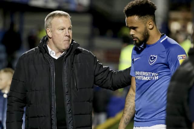 Kenny Jackett consoles Anton Walkes following last night's disappointing 1-1 draw with Bristol Rovers. Picture: Robin Jones/Digital South
