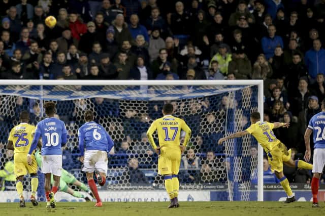Jonson Clarke-Harris fires his second penalty of the night high over the Pompey crossbar and into the Fratton End. Picture: Robin Jones/Digital South