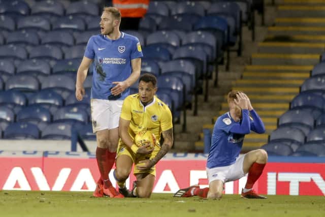Tom Naylor, right, dejected after conceding a first-half penalty against Bristol Rovers. Picture: Robin Jones