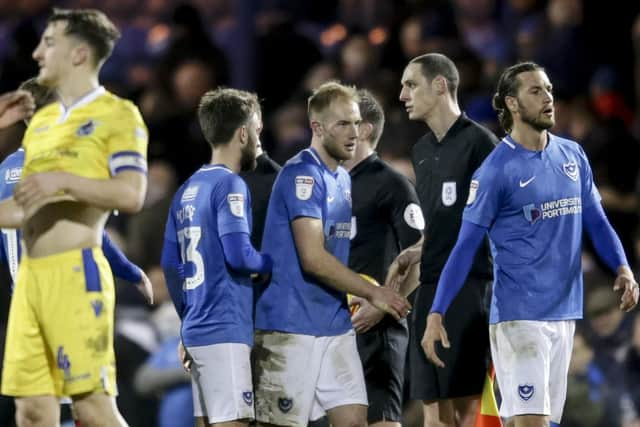 Christian Burgess dejected after Pompey's draw with Bristol Rover. Picture: Robin Jones/Digital South.