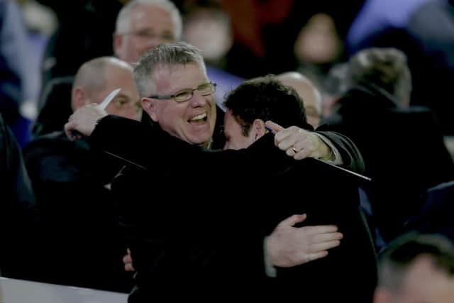 Andy Awford and Asmir Begovic embrace. Picture: Robin Jones