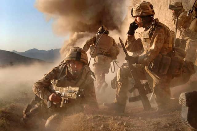 Pictured is M Company, 42 Commando Royal Marines, carrying out Operation Volcano against Taliban forces in the village of Barikyu in Nothern Helmand Province. Photo: MoD/Crown Copyright/PA Wire