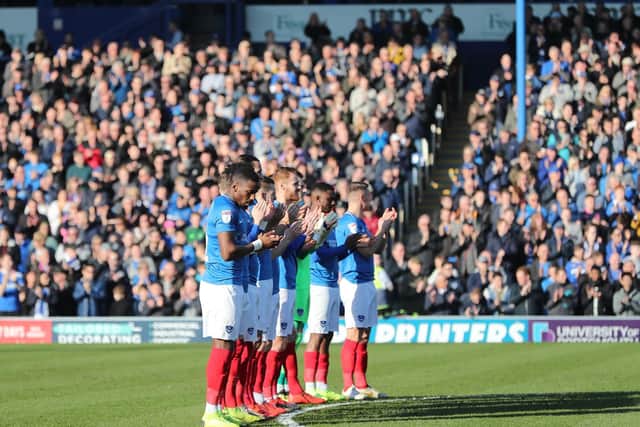 A minutes applause in memory of former Pompey player Mick Kennedy before the match