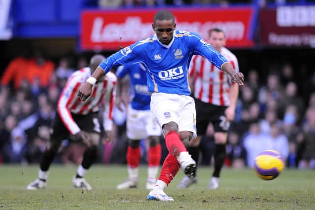 Jermain Defoe scores from the penalty spot against Sunderland in 2008