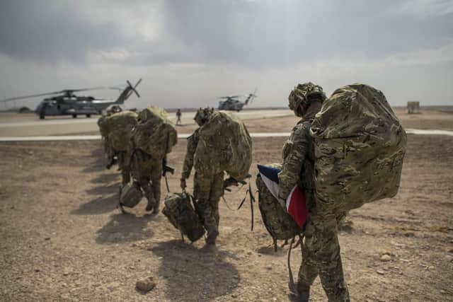 One of the last British troops leaving Camp Bastion in Helmand Province, Afghanistan. Campaigners have accused the government of not supporting veterans enough when they leave military service. Photo: Ben Birchall/PA Wire