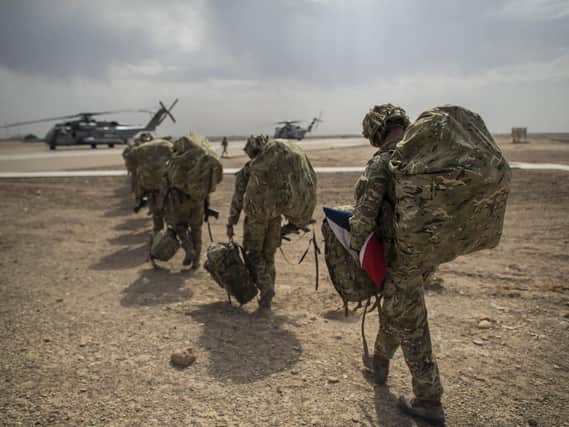File photo dated 27/10/14 of the last British troops leaving Camp Bastion in Helmand Province, Afghanistan. Photo: Ben Birchall/PA Wire