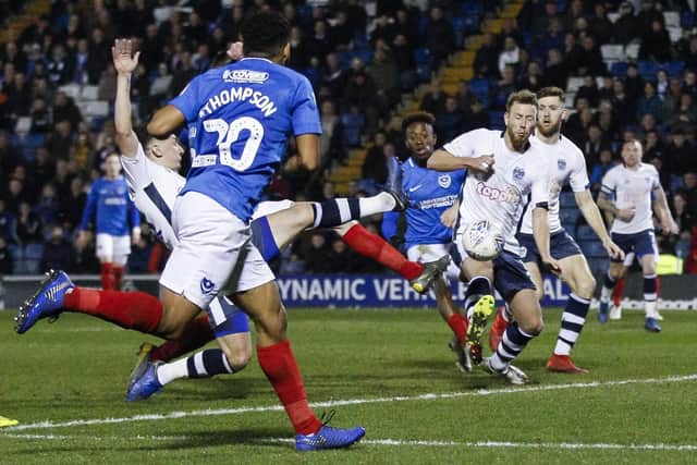 Oliver Hawkins, hidden, stretches to make it 2-0 against Bury. Picture: Daniel Chesterton/phcimages.com
