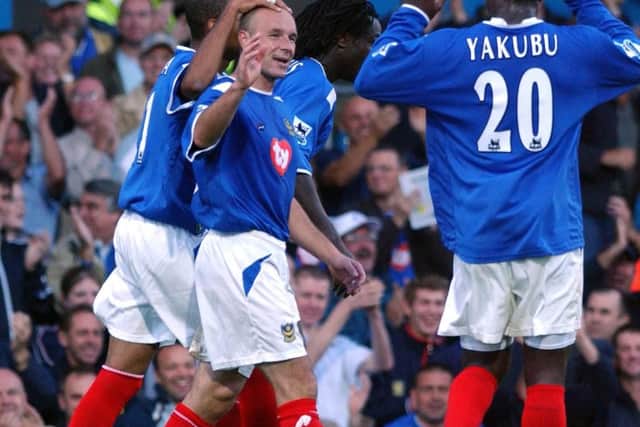 Pompey winger Steve Stone (second left) put in the cross that was flicked into his own net by Popovic