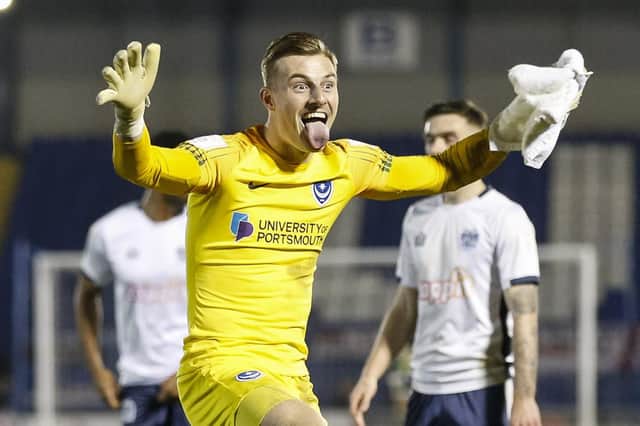 Craig MacGillivray celebrates following Pompey's 3-0 triumph at Bury which earned a Checkatrade Trophy final at Wembley. Picture: Daniel Chesterton/phcimages.com
